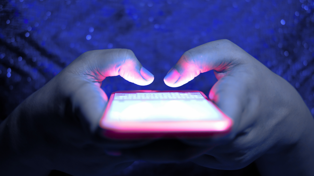 hands and a mobile phone